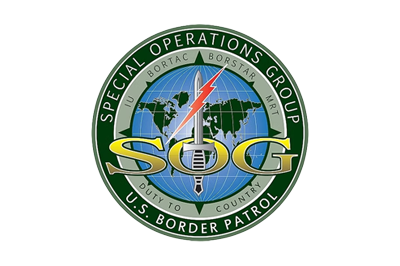 Logo for the United States Border Patrol's Special Operations Group. It shows a globe with the letters SOG with a sword and a red lightening bolt.