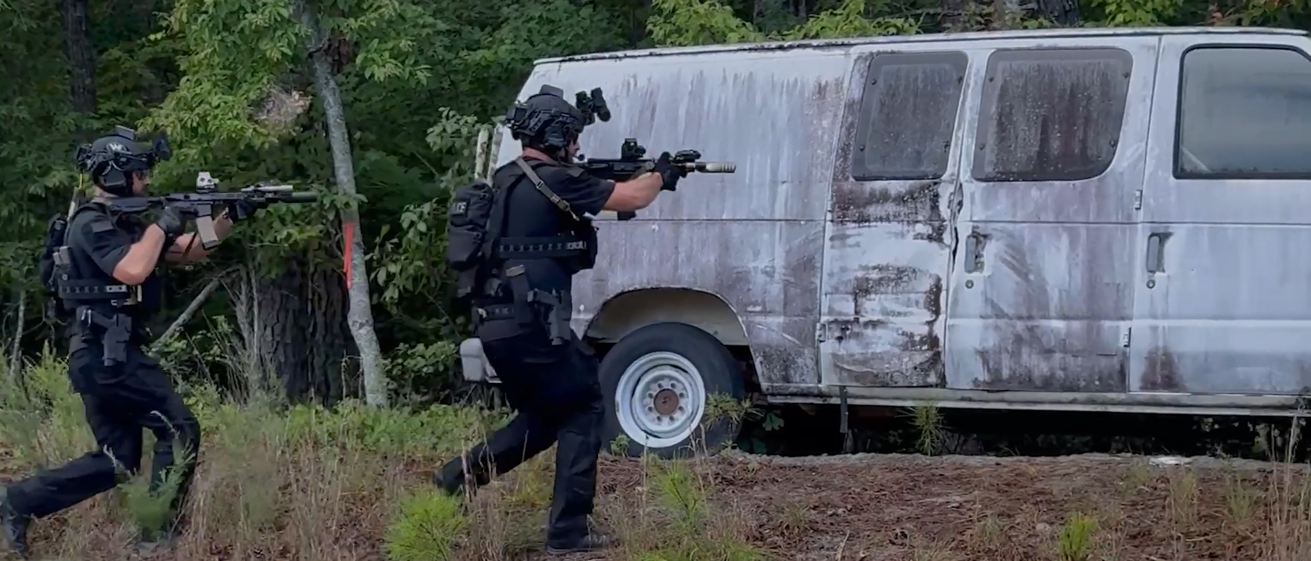 2 police officers wearing Team Wendy EXFIL Endurance helmets investigating a suspicious vehicle