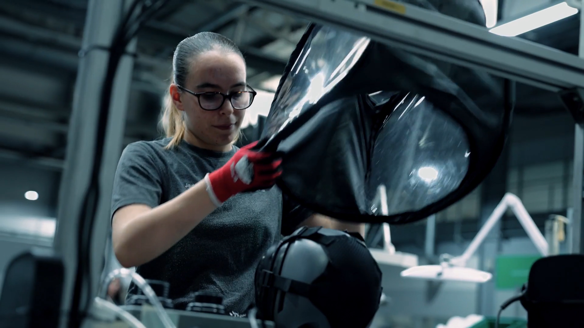 Woman using machinery