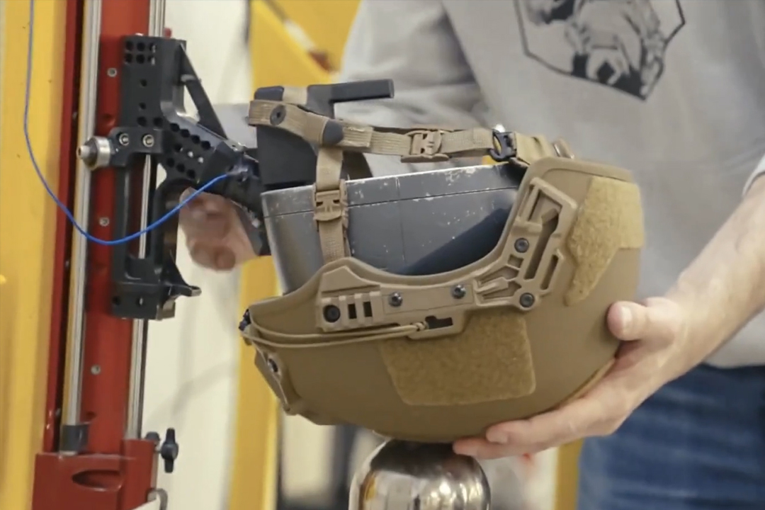 Helmet attached onto a test rig
